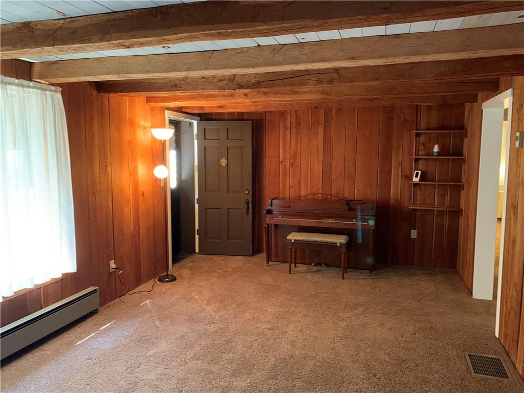 936 Blockhouse Run Road New Brighton, PA 15066 - Photo 3 of 25 Neutral carpeting underscores the living room...