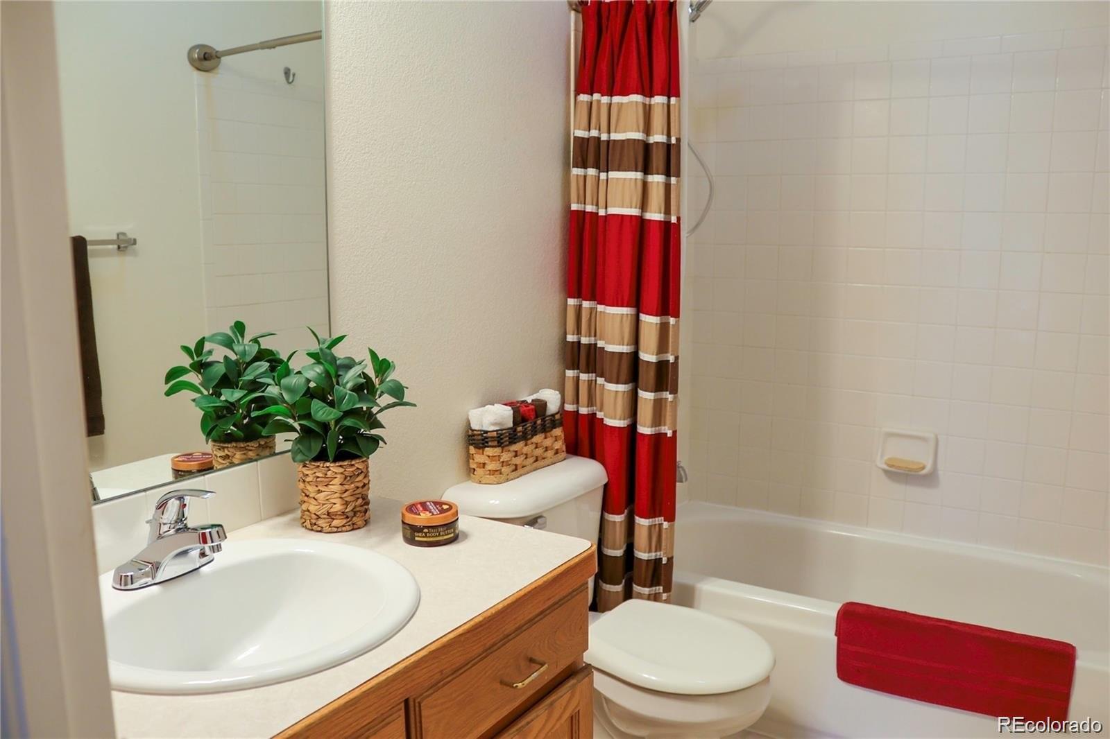2501 Remington Road Elizabeth, CO 80107 - Photo 29 of 33 a bathroom with a sink toilet and shower
