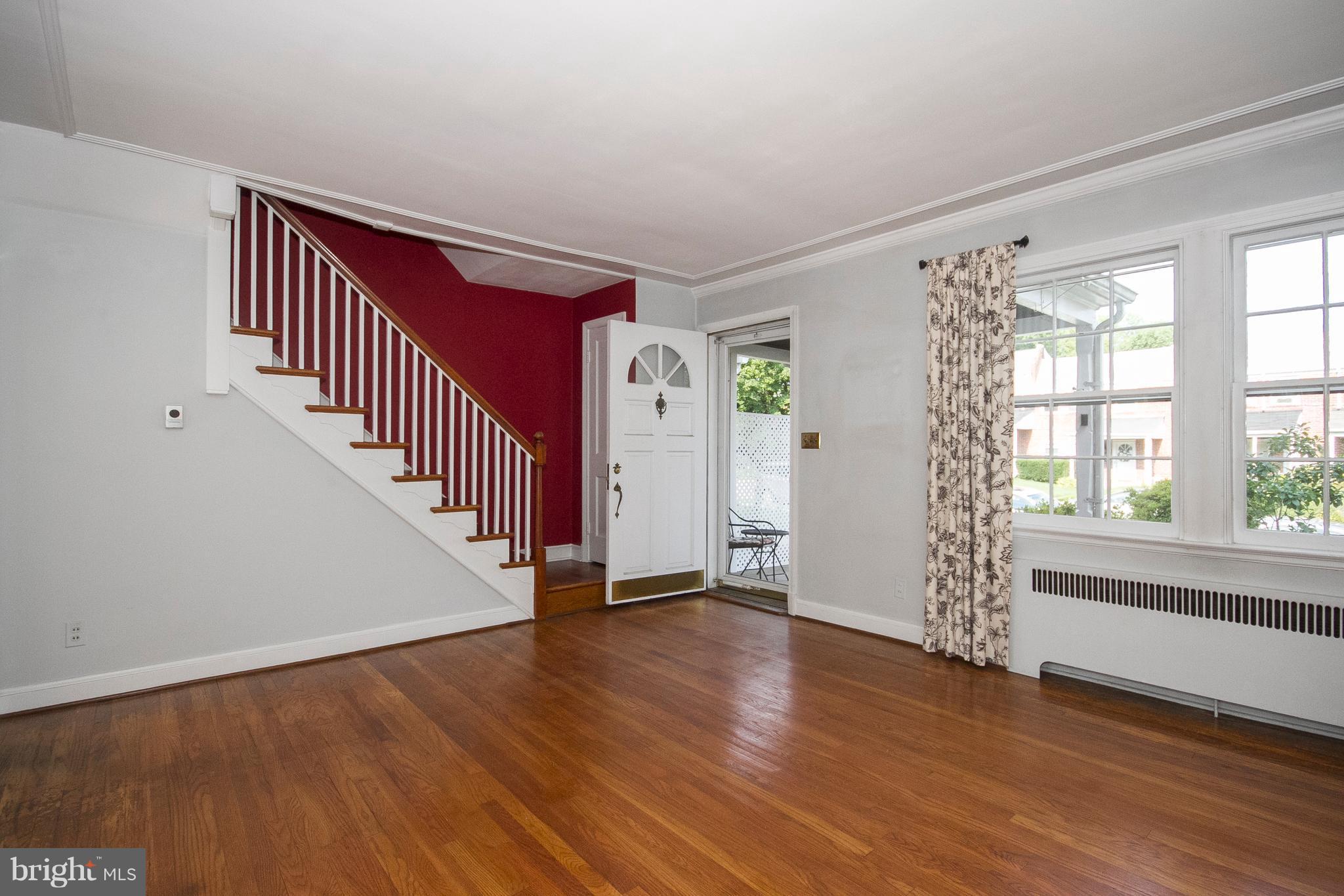 57 Burkshire Road Baltimore, MD 21286 - Photo 3 of 30 Living Room and Entry with Coat Closet