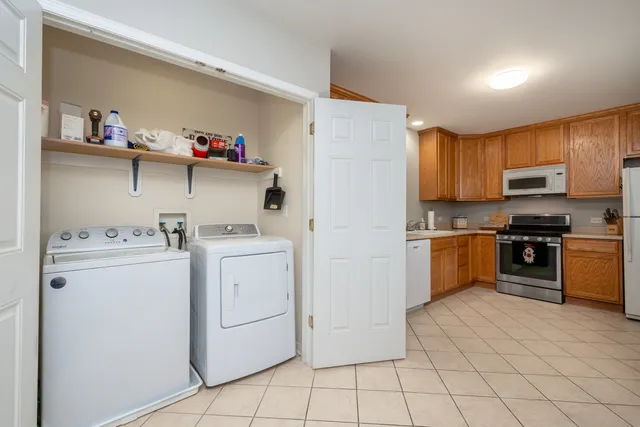 a view of a chair and table in the balcony