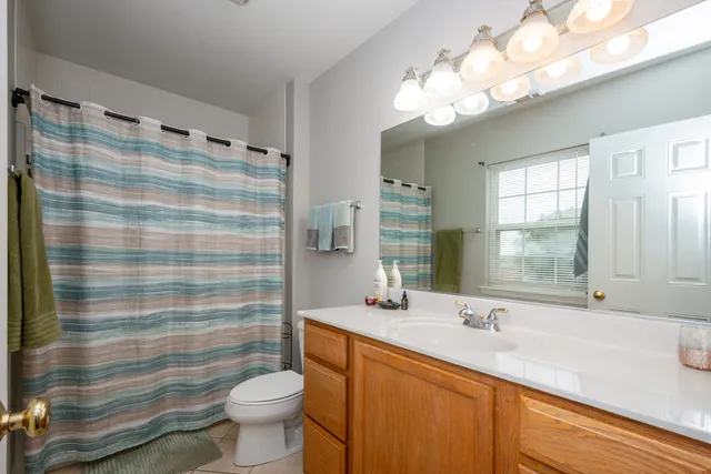 a kitchen with a sink cabinets and appliances