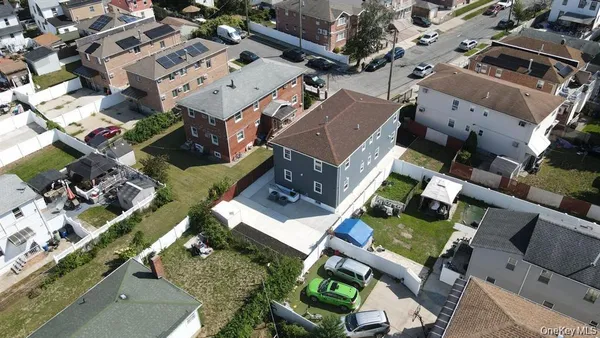 an aerial view of a house with a outdoor space