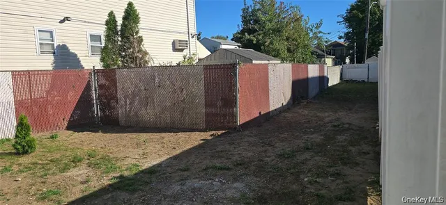 a view of a wooden fence