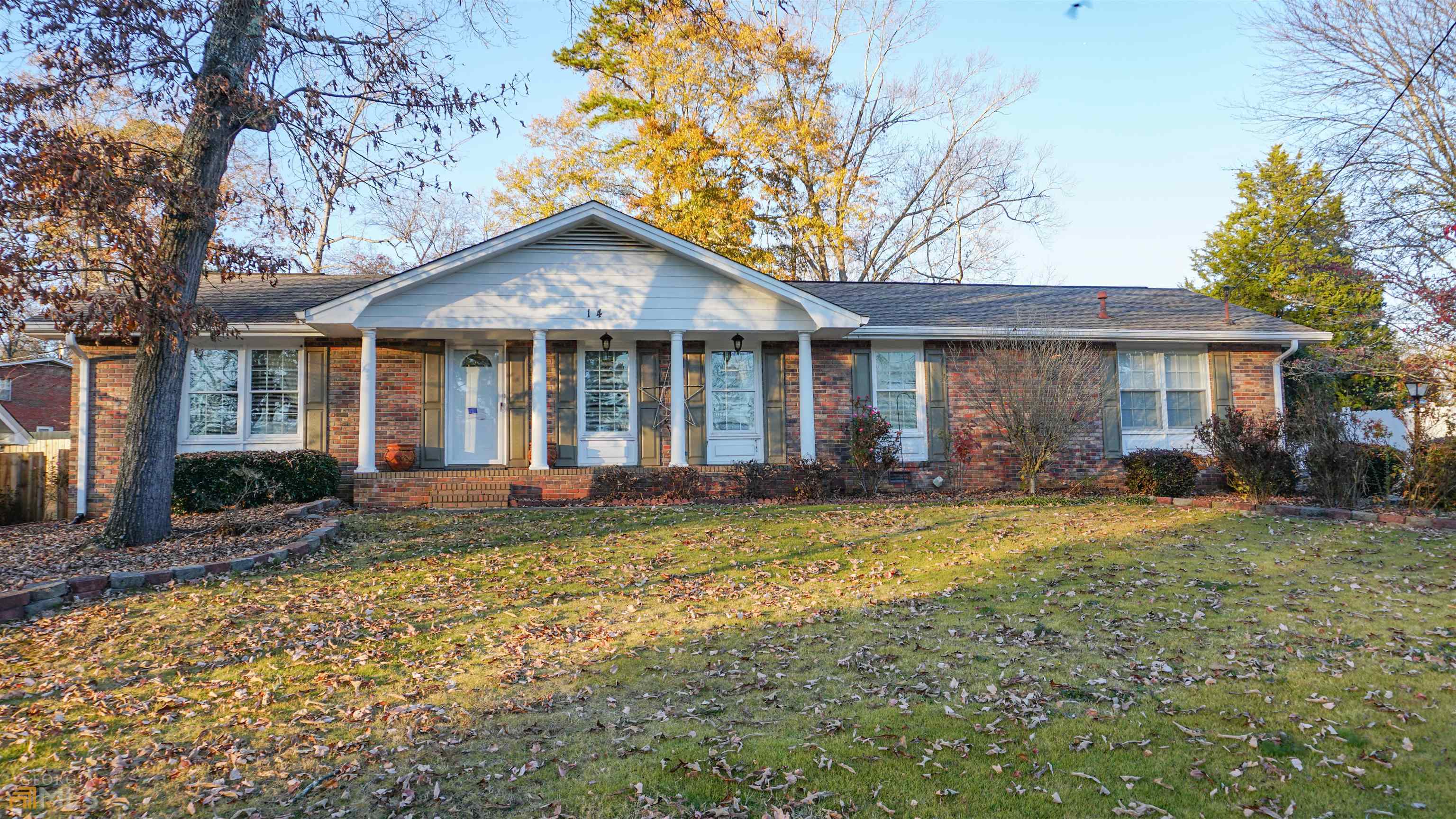14 Wilson Drive Southwest Rome, GA 30165 - Photo 1 of 1 a front view of a house with a yard and porch