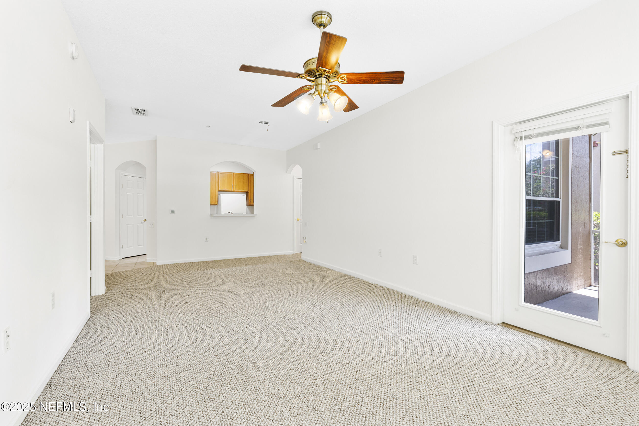 7990 Baymeadows Road East, Unit 120 Jacksonville, FL 32256 - Photo 12 of 38 a view of room with window and ceiling fan