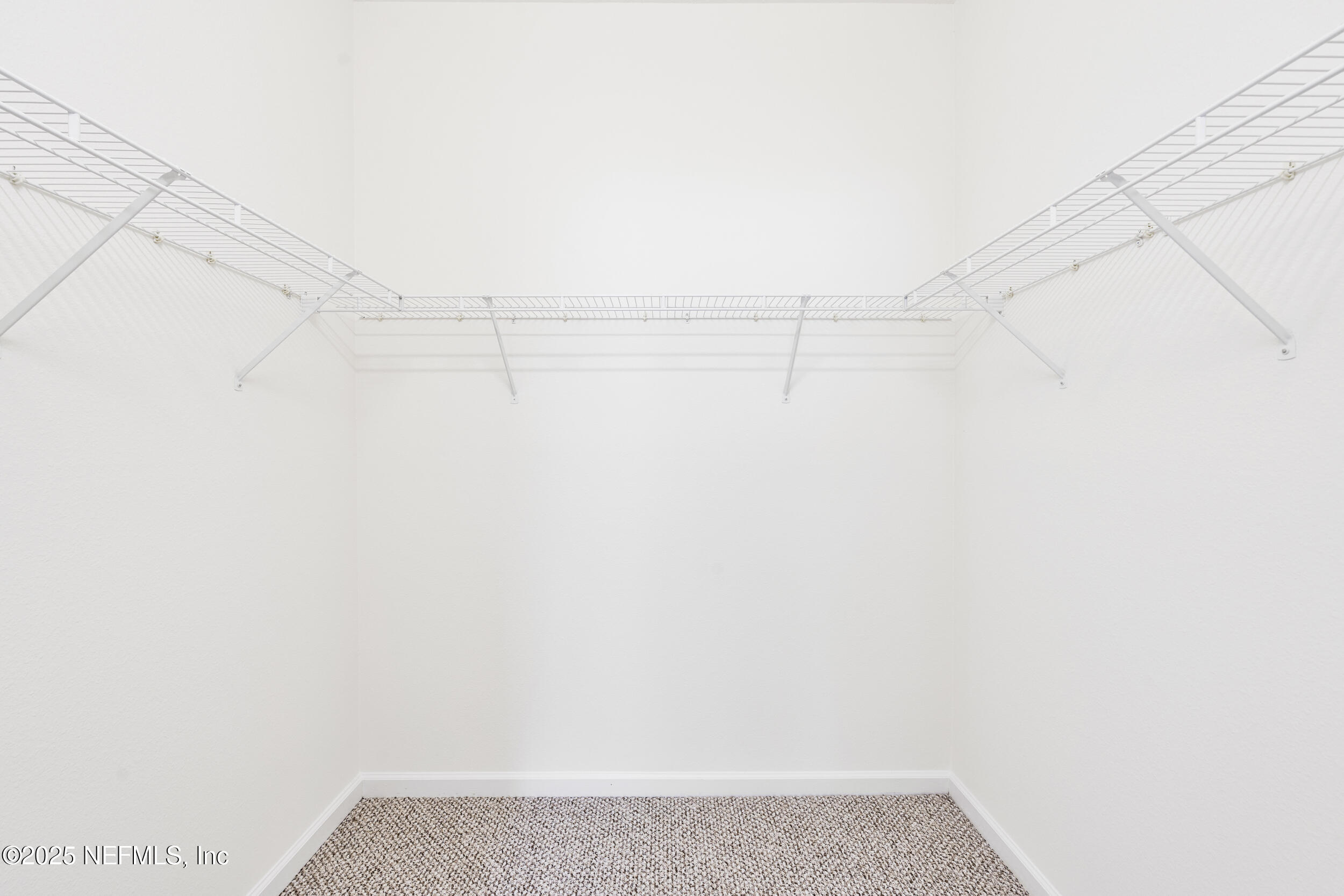 7990 Baymeadows Road East, Unit 120 Jacksonville, FL 32256 - Photo 24 of 38 a view of small space with empty racks