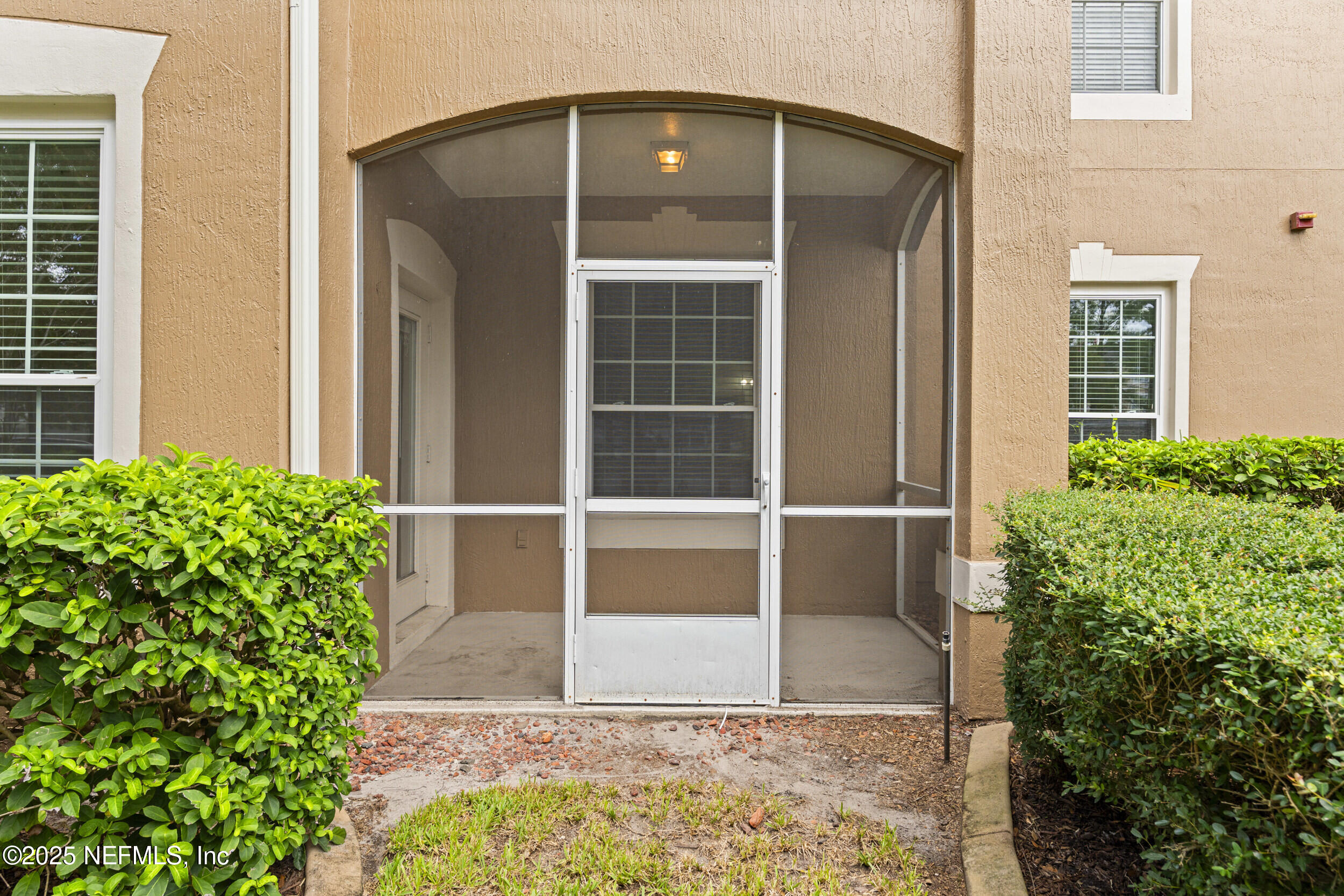 7990 Baymeadows Road East, Unit 120 Jacksonville, FL 32256 - Photo 26 of 38 a house view with a outdoor space