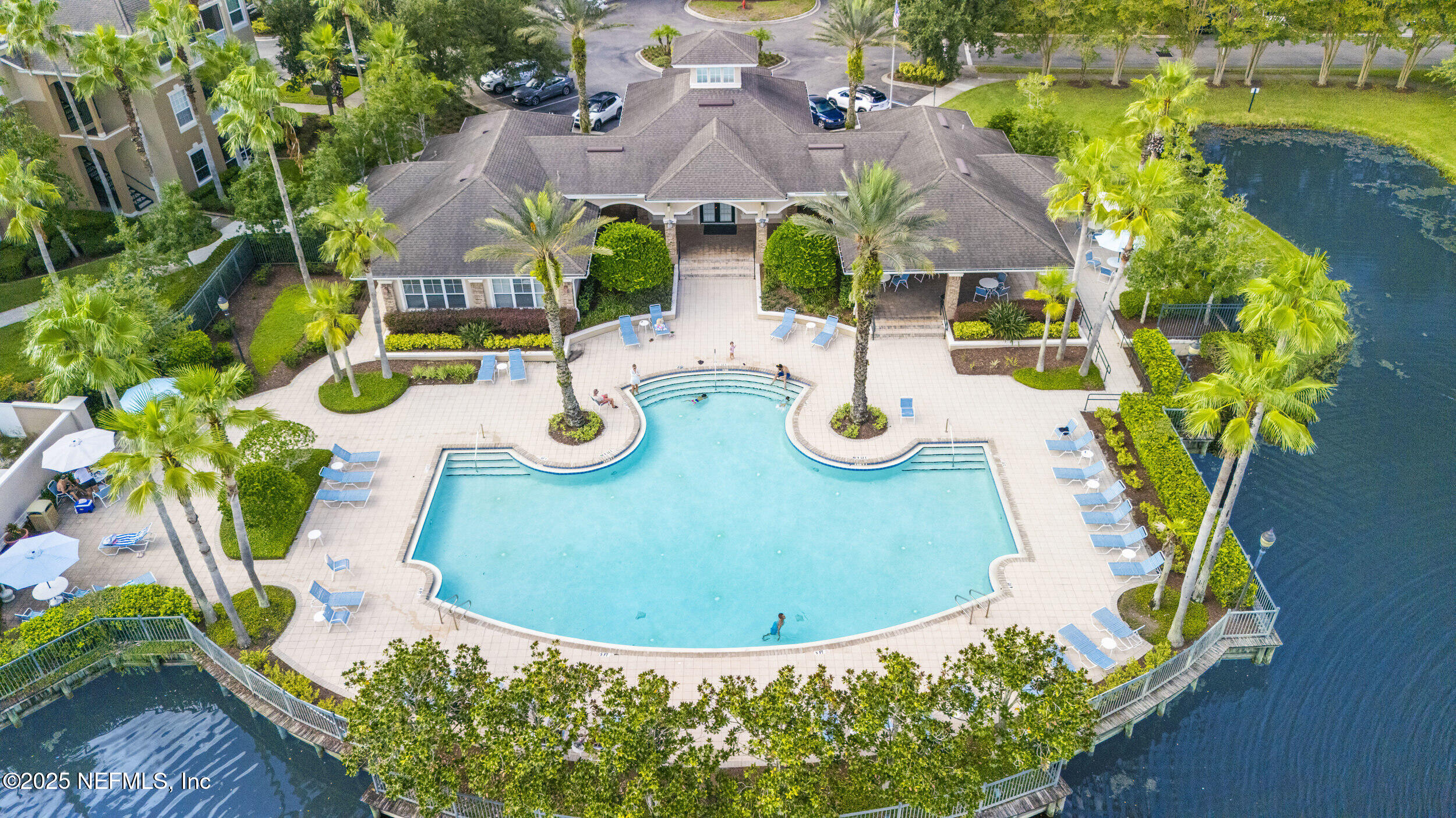 7990 Baymeadows Road East, Unit 120 Jacksonville, FL 32256 - Photo 29 of 38 an aerial view of residential house with outdoor space and swimming pool