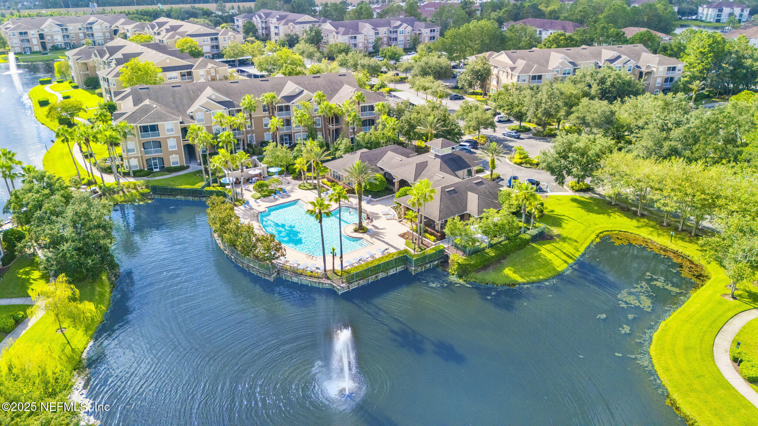 7990 Baymeadows Road East, Unit 120 Jacksonville, FL 32256 - Photo 30 of 38 a view of a swimming pool with some plants