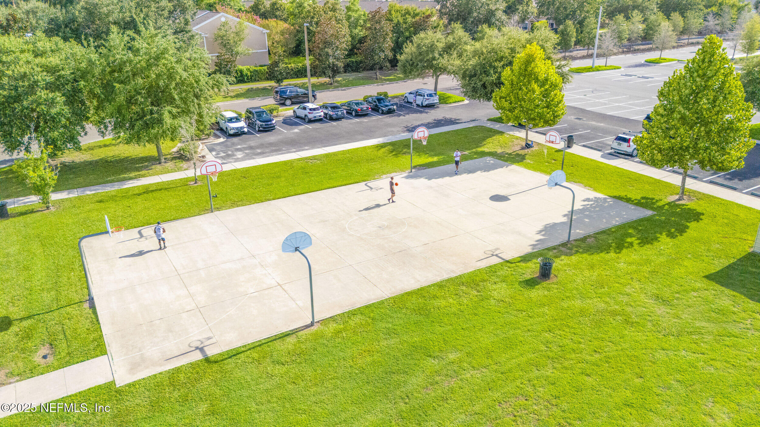 7990 Baymeadows Road East, Unit 120 Jacksonville, FL 32256 - Photo 32 of 38 a view of a backyard with swimming pool