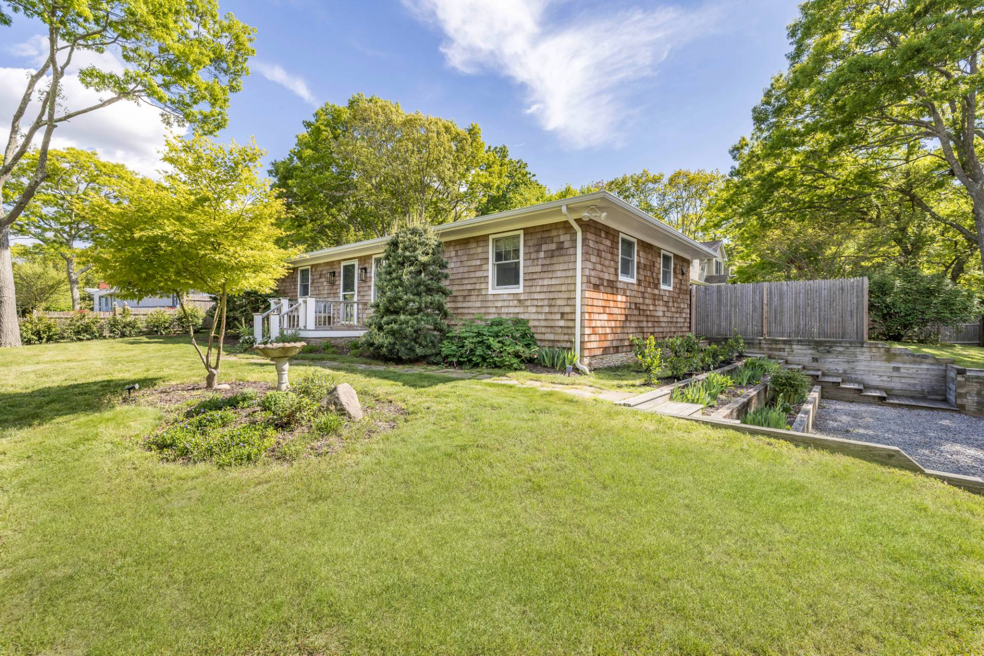 40 Ridge Road West Sag Harbor, NY 11963 - Photo 26 of 27 a view of a house with backyard and sitting area