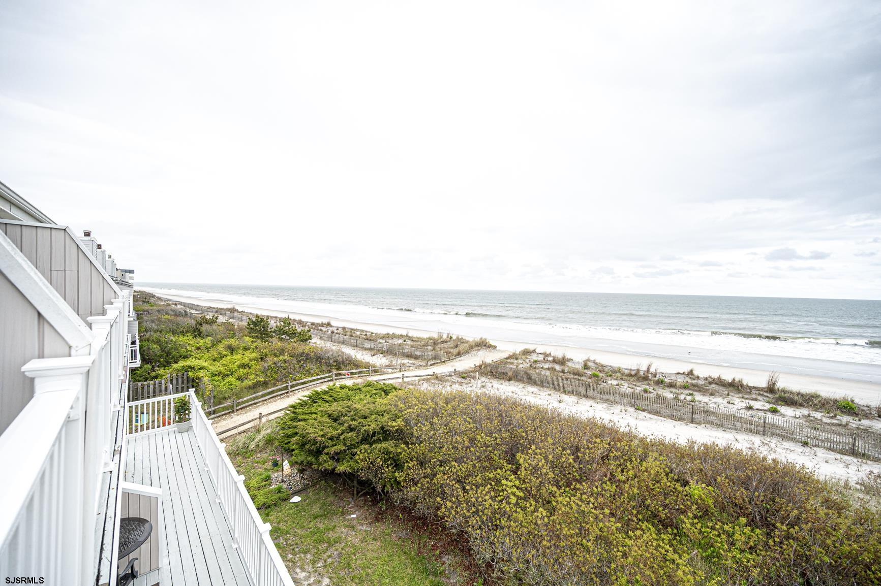 400 East Brigantine Avenue, Unit 2C Brigantine, NJ 08203 - Photo 24 of 37 a view of an ocean and beach