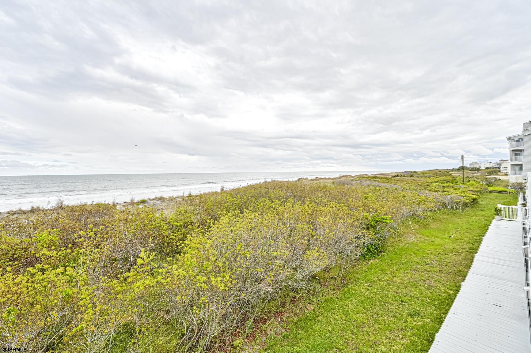 400 East Brigantine Avenue, Unit 2C Brigantine, NJ 08203 - Photo 30 of 37 a view of an ocean from a beach