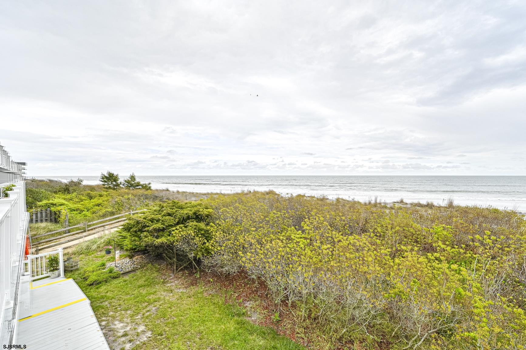 400 East Brigantine Avenue, Unit 2C Brigantine, NJ 08203 - Photo 31 of 37 a view of an ocean and a mountain