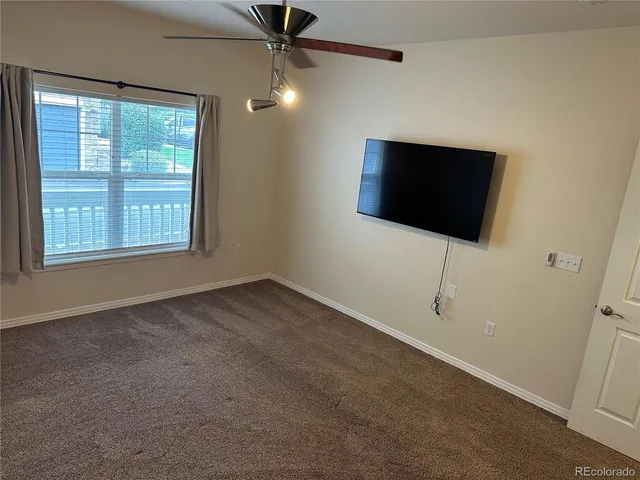 a view of a livingroom with a flat screen tv