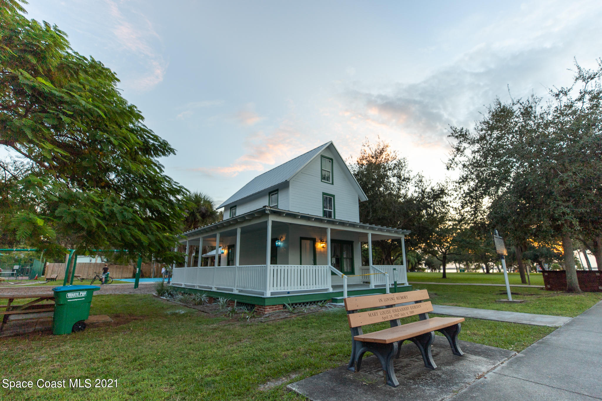 1465 South Harbor City Boulevard, Unit 404 Melbourne, FL 32901 - Photo 23 of 55 a front view of a house with a garden and sitting area