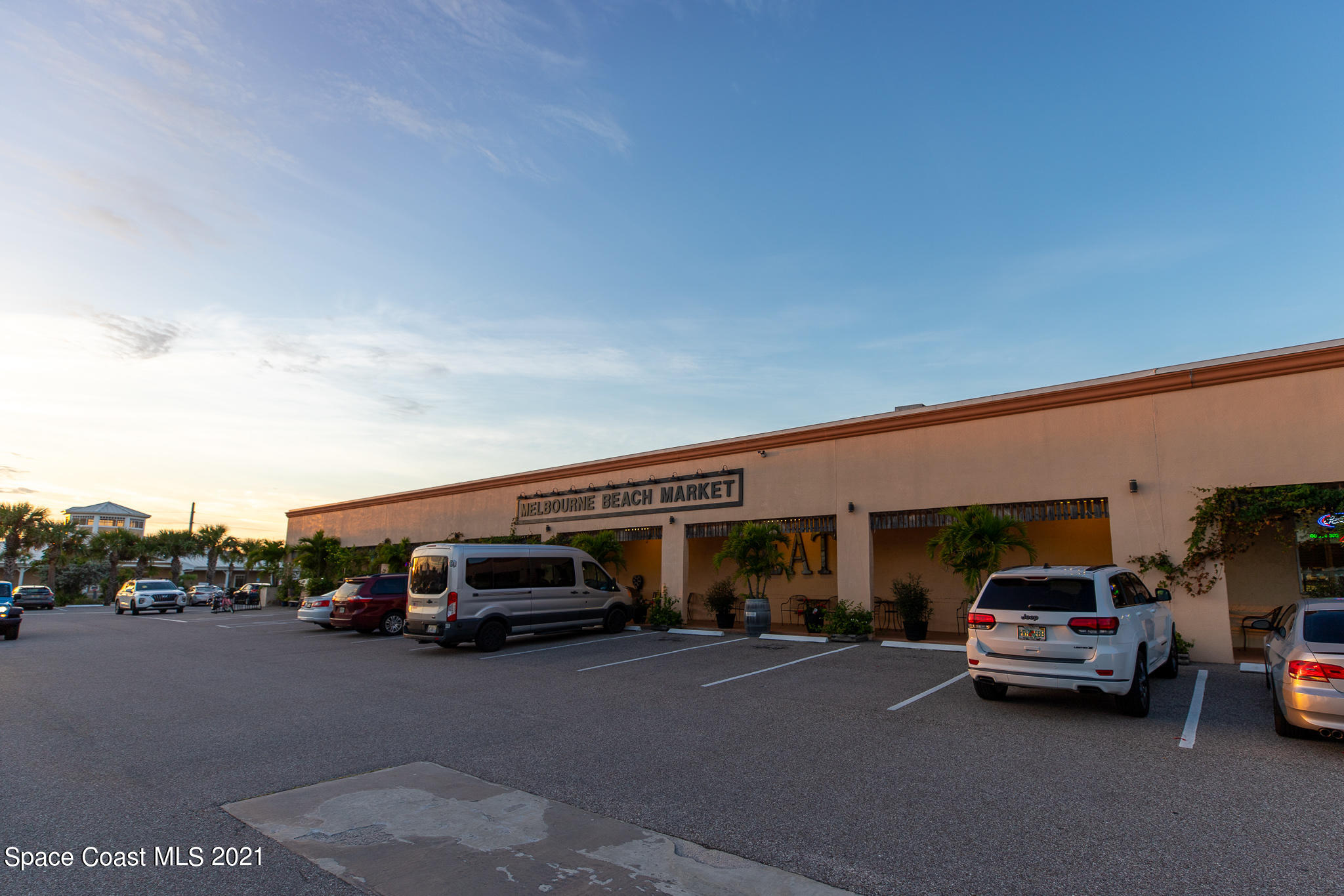 1465 South Harbor City Boulevard, Unit 404 Melbourne, FL 32901 - Photo 43 of 55 a car parked in front of a building