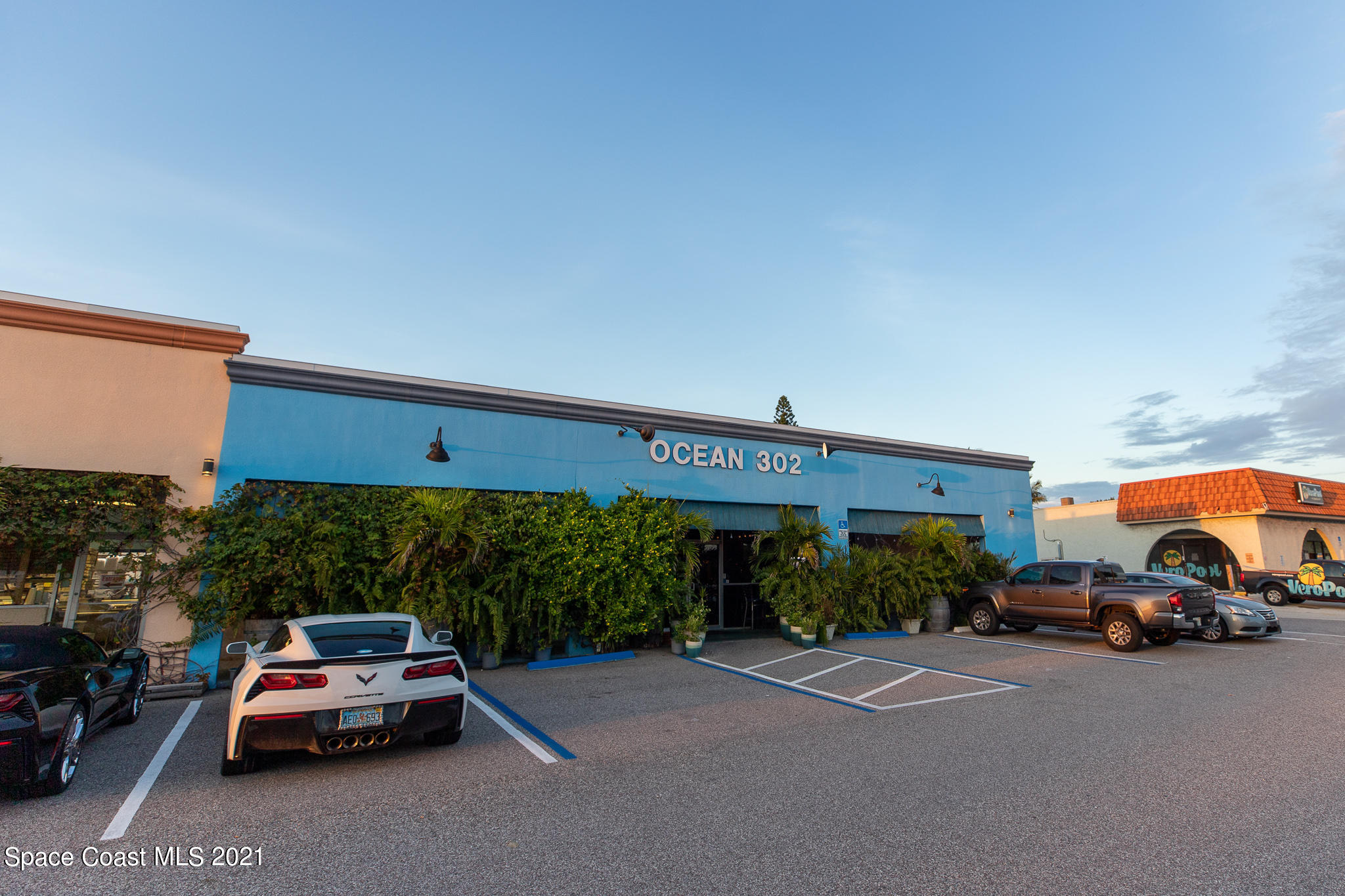 1465 South Harbor City Boulevard, Unit 404 Melbourne, FL 32901 - Photo 44 of 55 a car parked in front of a building
