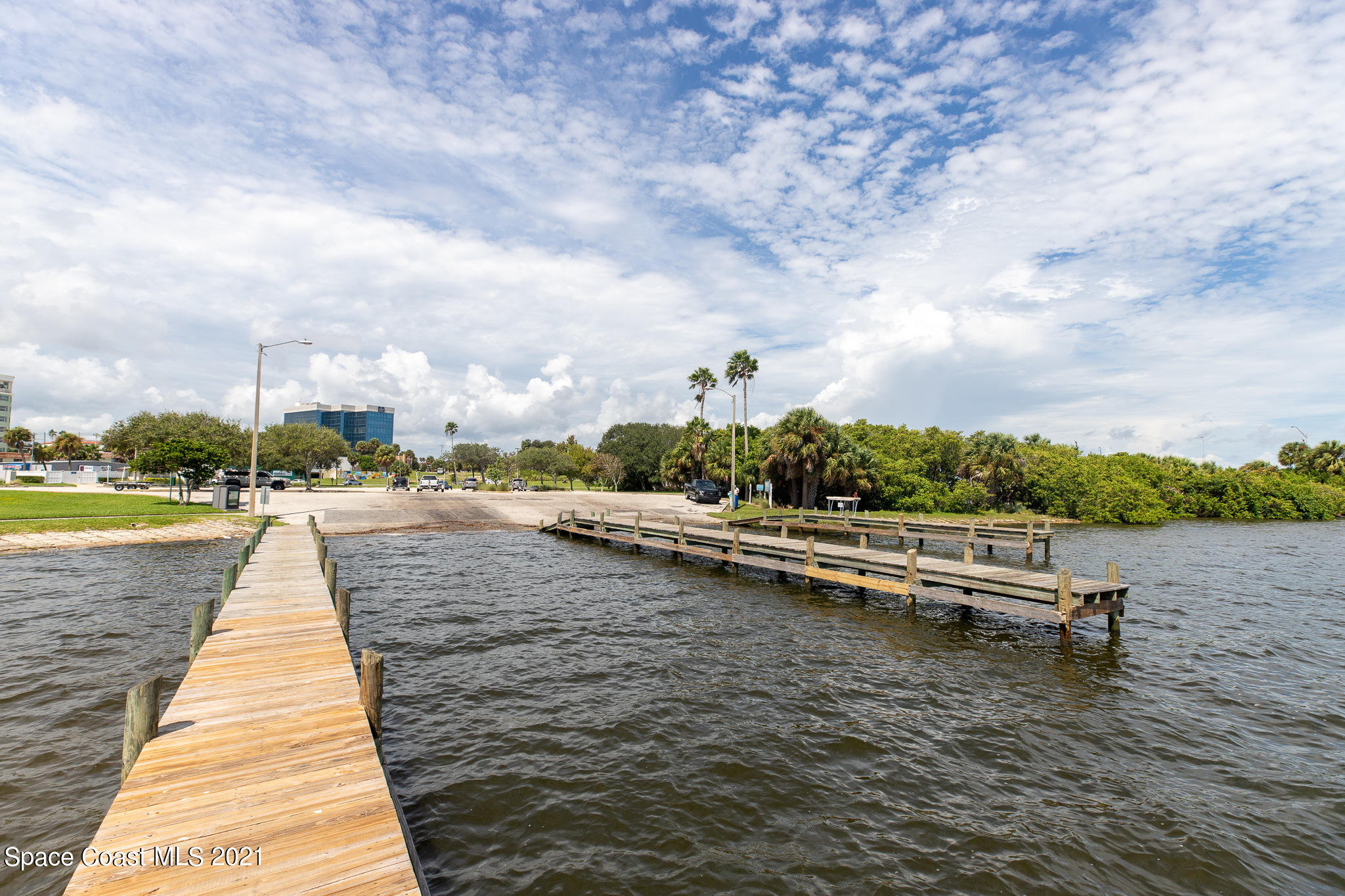 1465 South Harbor City Boulevard, Unit 404 Melbourne, FL 32901 - Photo 54 of 55 a view of swimming pool with a yard