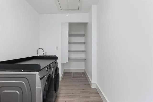 a utility room with dryer and washer