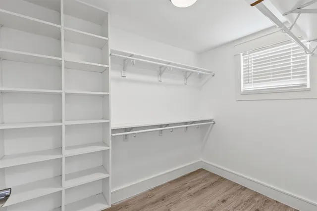 a view of an empty walk in closet