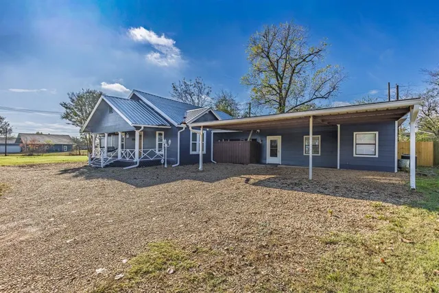 a view of a house with a patio