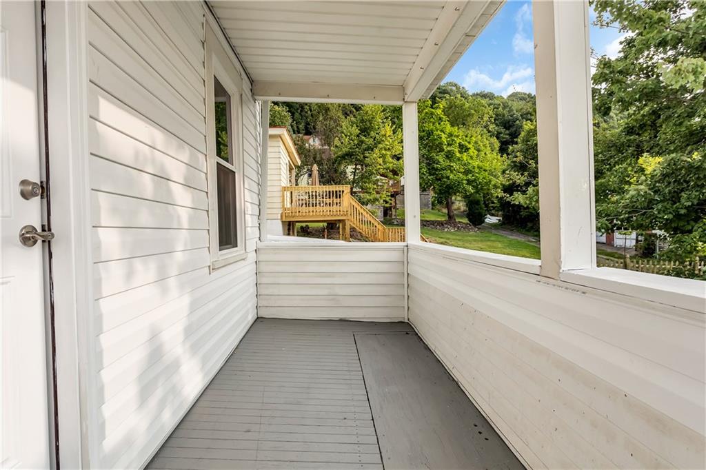 817 13th Street McKees Rocks, PA 15136 - Photo 11 of 18 Private back porch is an enjoyable place to sit and take in the outdoors.