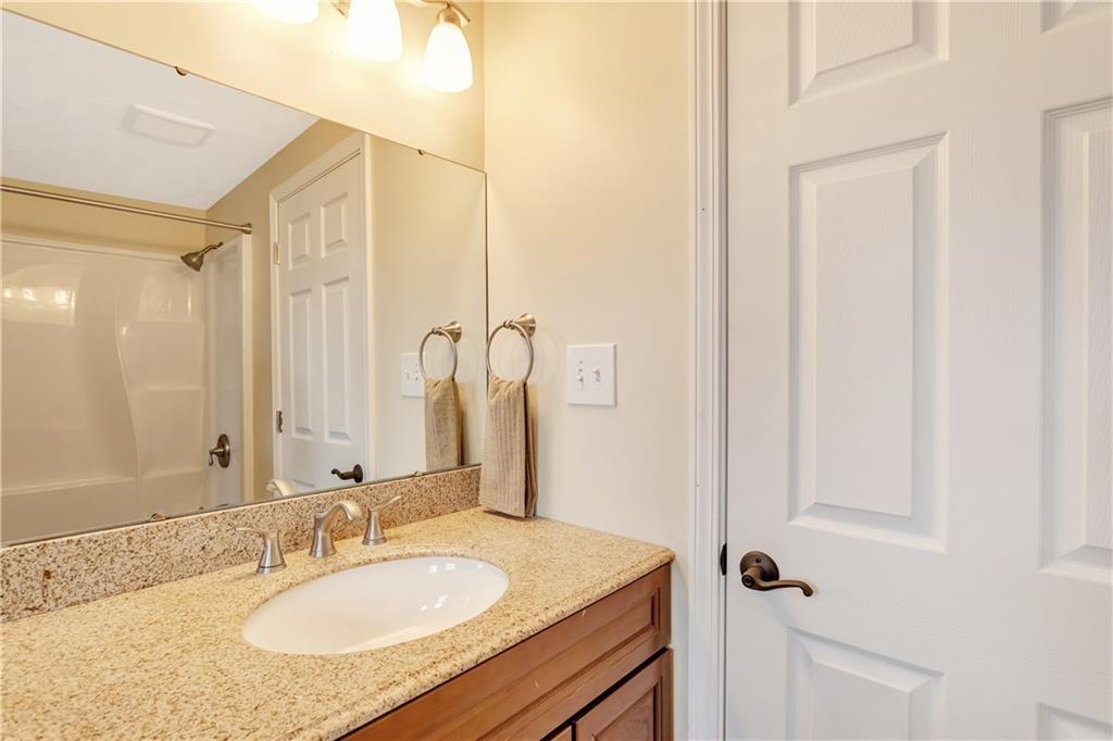 817 13th Street McKees Rocks, PA 15136 - Photo 15 of 18 Second floor bathroom with new granite countertops and vanity.
