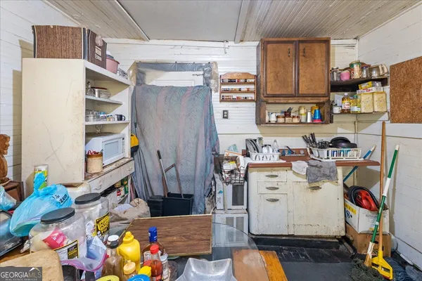 a storage room with washer and dryer
