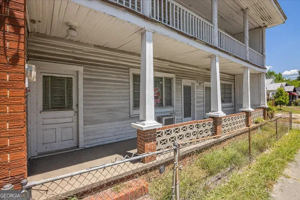 a view of house with patio