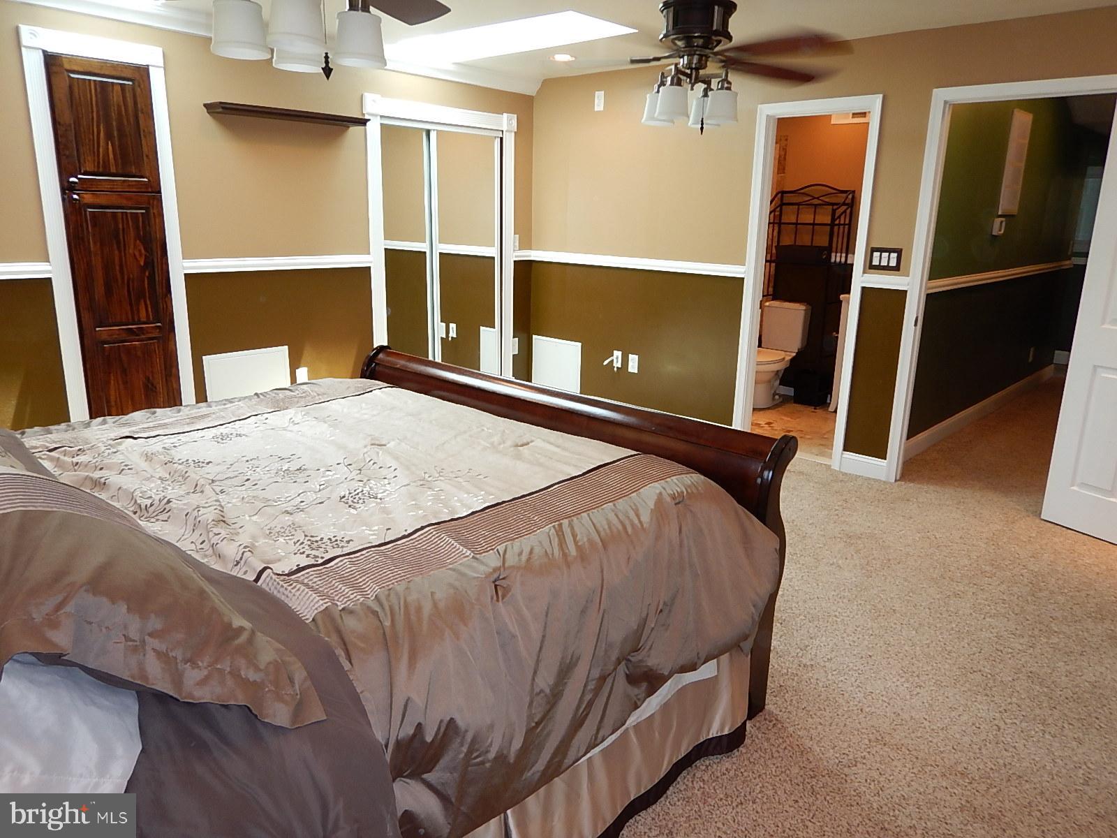 815 Ferguson Road Joppa, MD 21085 - Photo 33 of 37 Master Bedroom, plenty of closet space, skylights