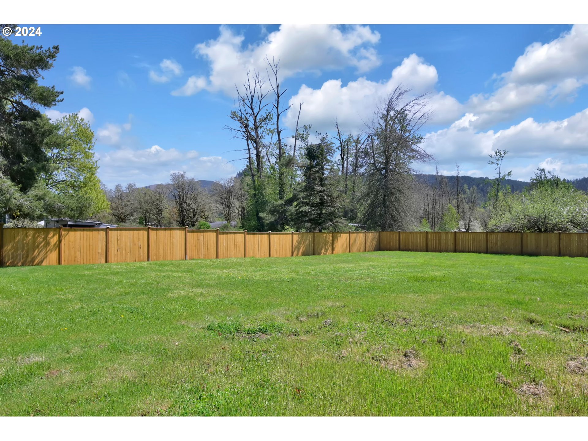 92045 Maple Lane Springfield, OR 97478 - Photo 16 of 21 a view of outdoor space with deck and yard