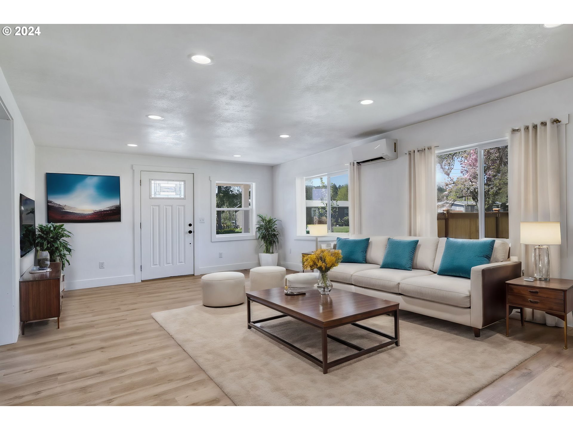 92045 Maple Lane Springfield, OR 97478 - Photo 2 of 21 a living room with furniture and a flat screen tv