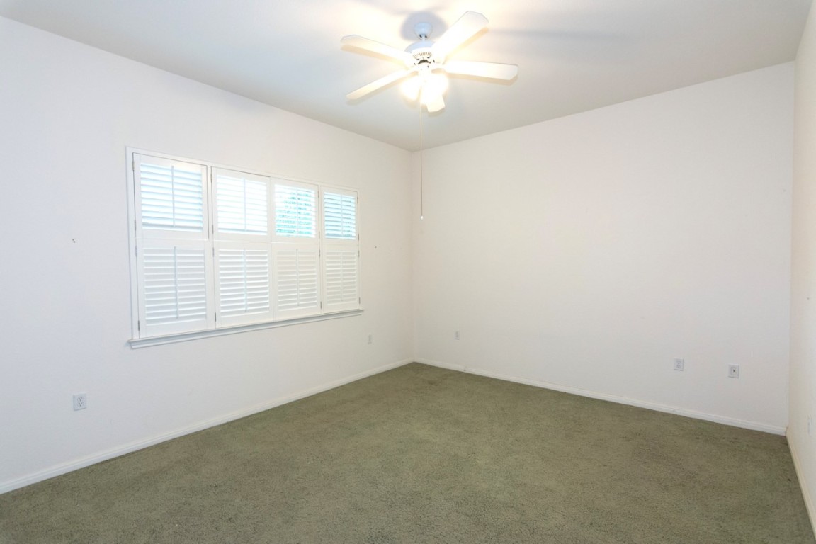 102 Harness Lane Georgetown, TX 78633 - Photo 18 of 32 Master Suite, fan, carpet, plantation shutters