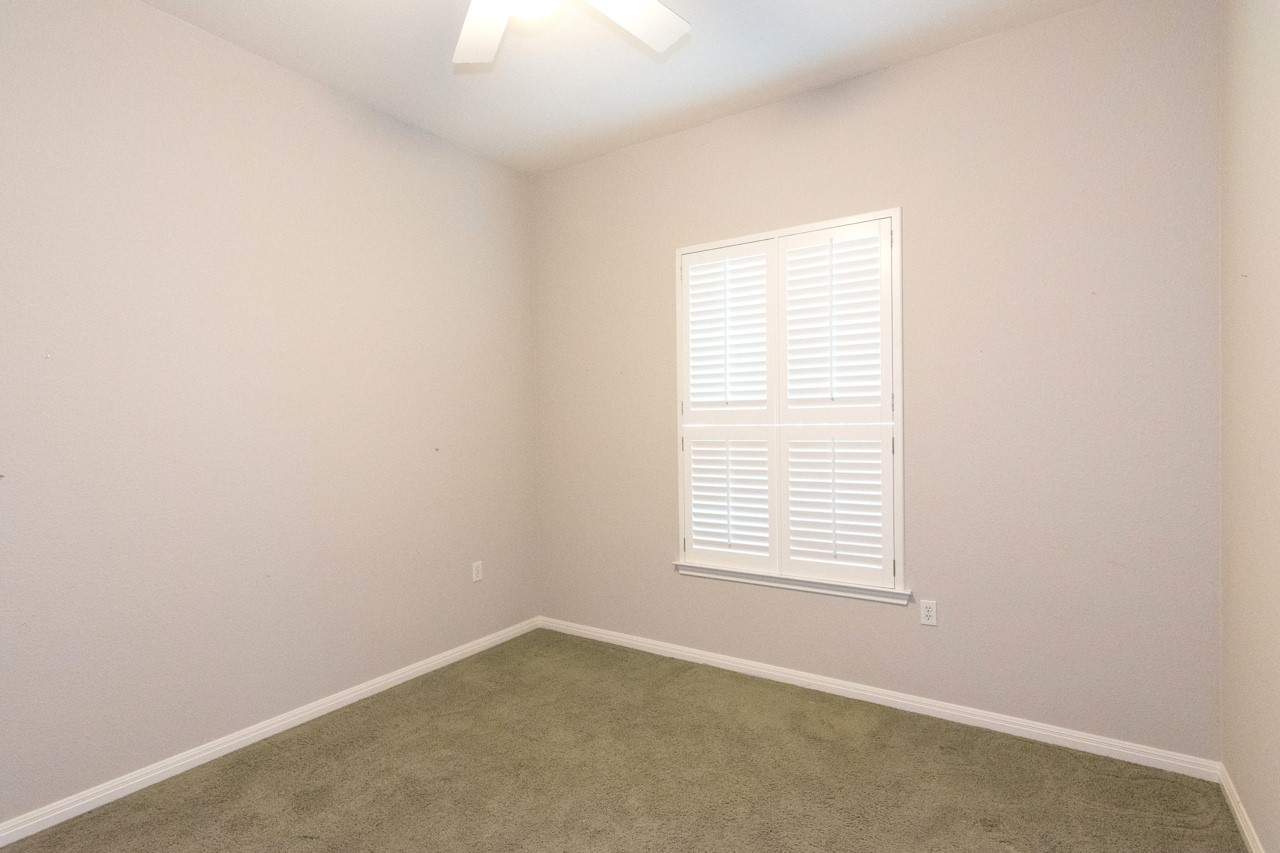 102 Harness Lane Georgetown, TX 78633 - Photo 19 of 32 an empty room with a window