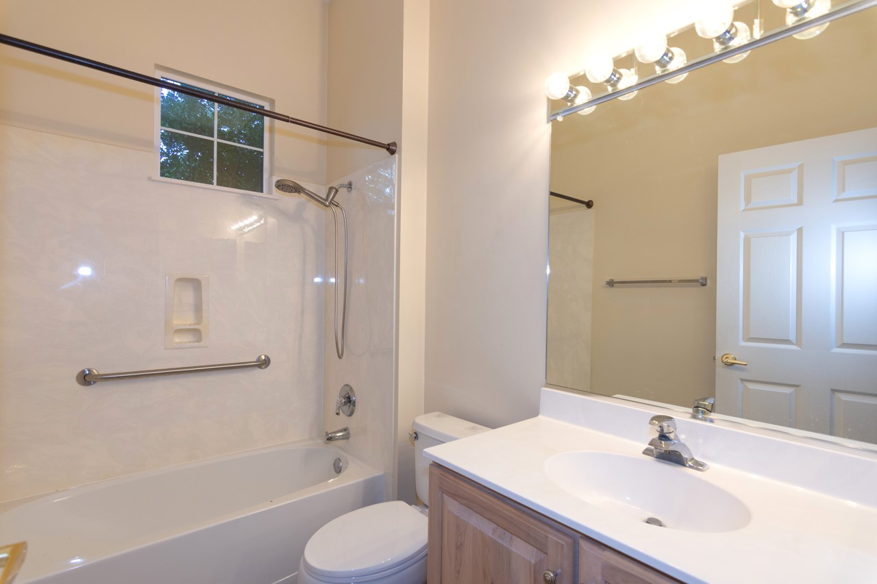102 Harness Lane Georgetown, TX 78633 - Photo 20 of 32 a bathroom with a sink toilet and shower