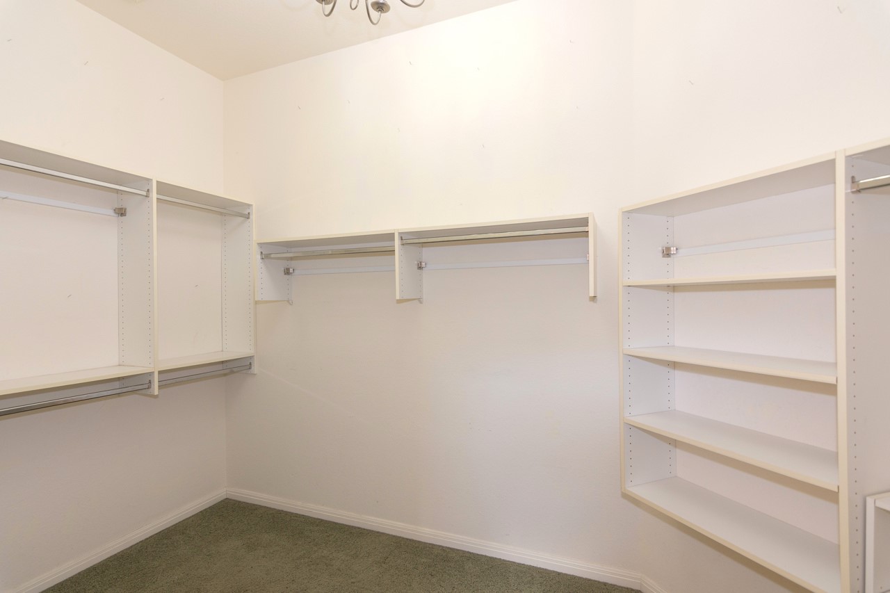 102 Harness Lane Georgetown, TX 78633 - Photo 23 of 32 a view of an empty walk in closet