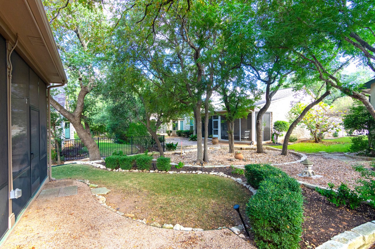 102 Harness Lane Georgetown, TX 78633 - Photo 32 of 32 a view of a chair and table in backyard of the house
