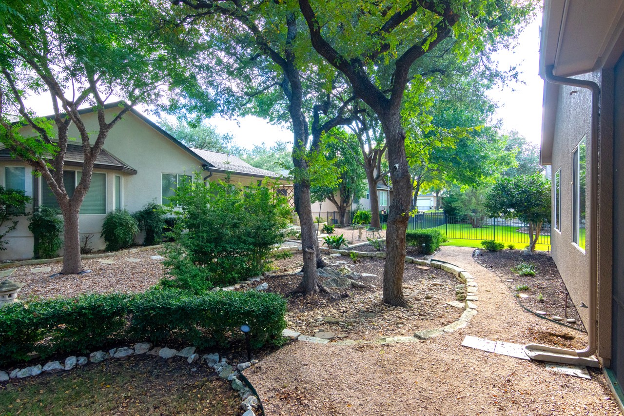 102 Harness Lane Georgetown, TX 78633 - Photo 6 of 32 a view of a swimming pool with a lounge chair