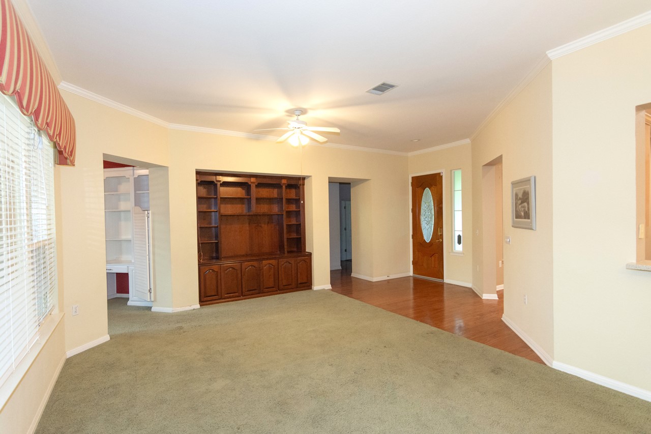 102 Harness Lane Georgetown, TX 78633 - Photo 9 of 32 a view of an empty room with a window