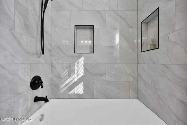 a bathroom with a bathtub