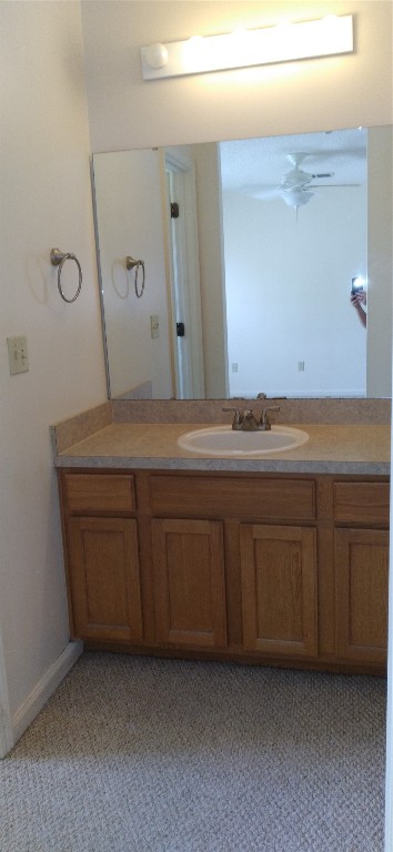96050 Starlight Lane Yulee, FL 32097 - Photo 12 of 18 a bathroom with a sink vanity and mirror