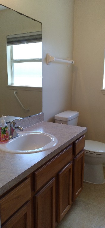 96050 Starlight Lane Yulee, FL 32097 - Photo 16 of 18 a bathroom with a sink and a mirror