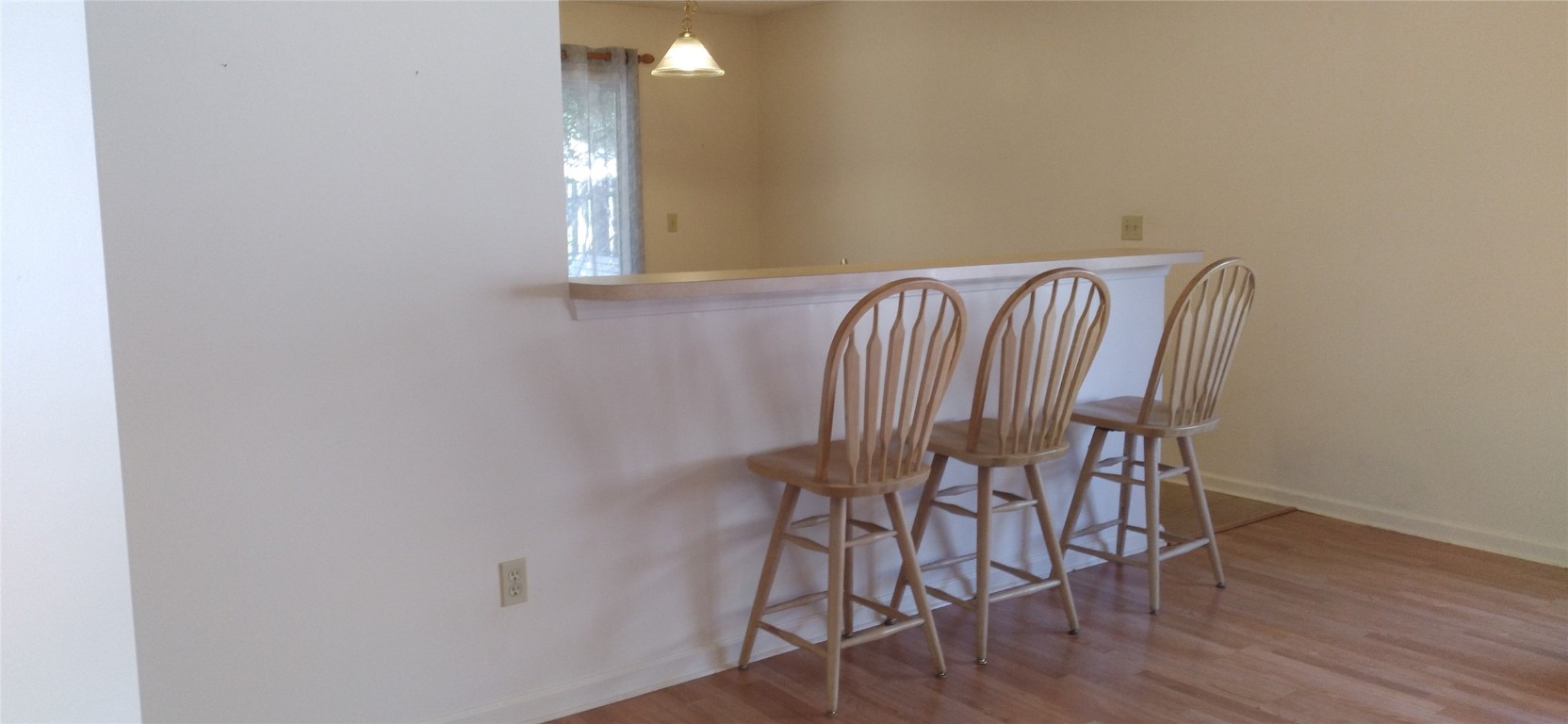96050 Starlight Lane Yulee, FL 32097 - Photo 7 of 18 a view of a livingroom with furniture and wooden floor