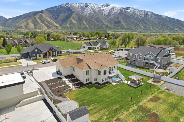 283 North 500 West Mapleton, UT 84664 - Photo 96 of 102 Aerial perspective of suburban area with a mountain backdrop.