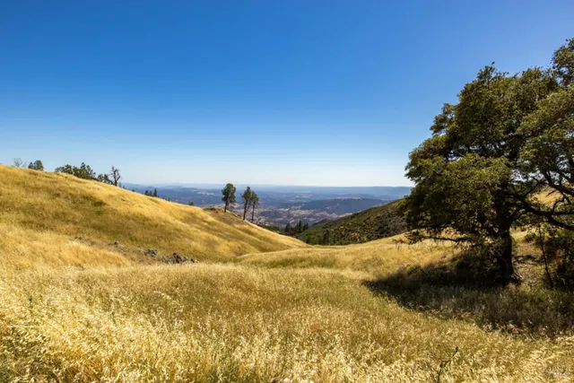 a view of mountain view with mountains in the background