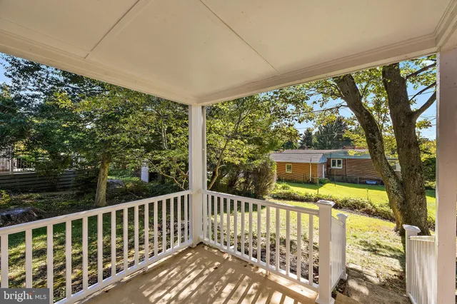 a view of house with yard