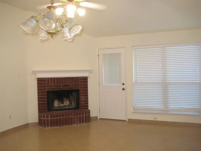 a living room with a fireplace