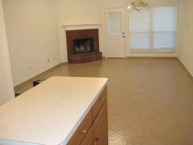 a bathroom with a shower and a toilet