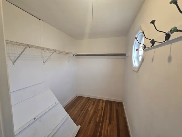 a view of a room with racks on the wall